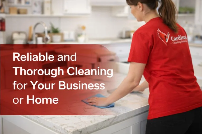 Woman cleaning a countertop in a kitchen