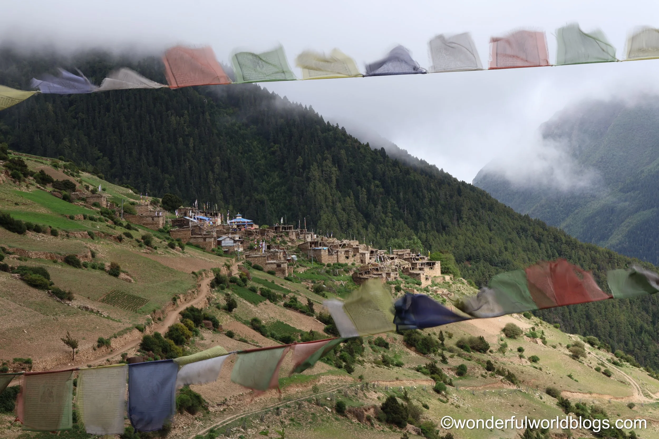 Prayer flags in the mountains on the Annapurna Circuit Trek Nepal