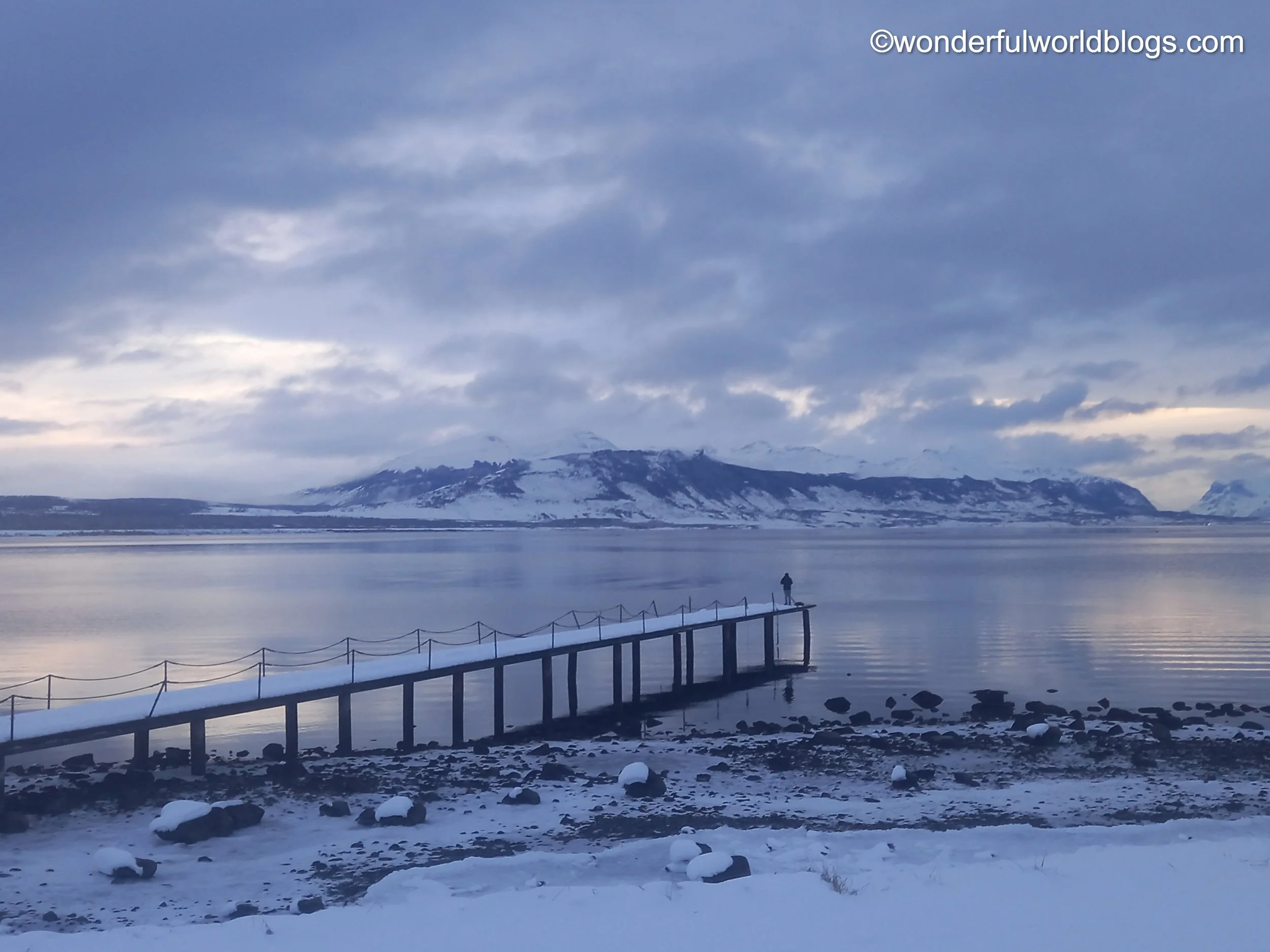 Man on pier in Puerto Natales Patagonia