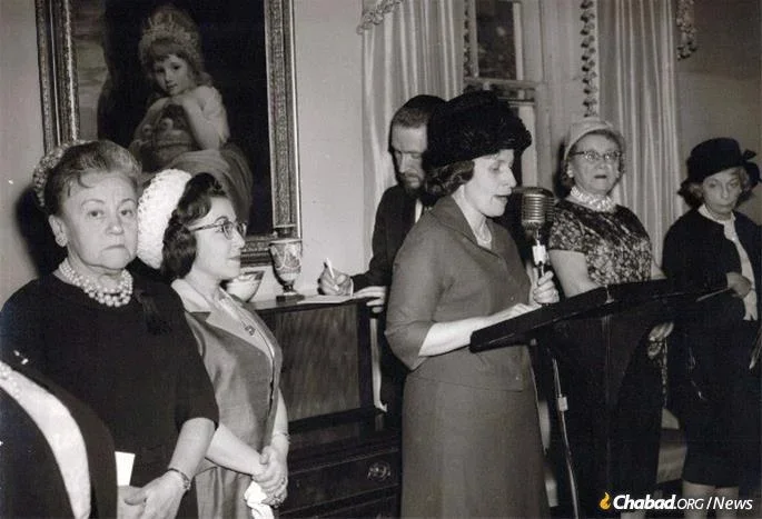 In 1962, Rebbetzin Hecht spoke at a fundraiser for Colony of Hope at Gracie Mansion during the tenure of Mayor Robert Wagner.