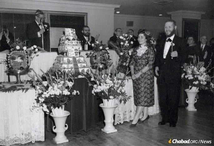 Rabbi and Rebbetzin Hecht at a party honoring their "Bar-Mitzvah" - 13 years of their service in Congregation Yeshiva Rabbi Meir Simcha HaKohen.