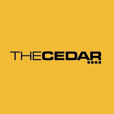 Logo of The Cedar with a yellow background and black text