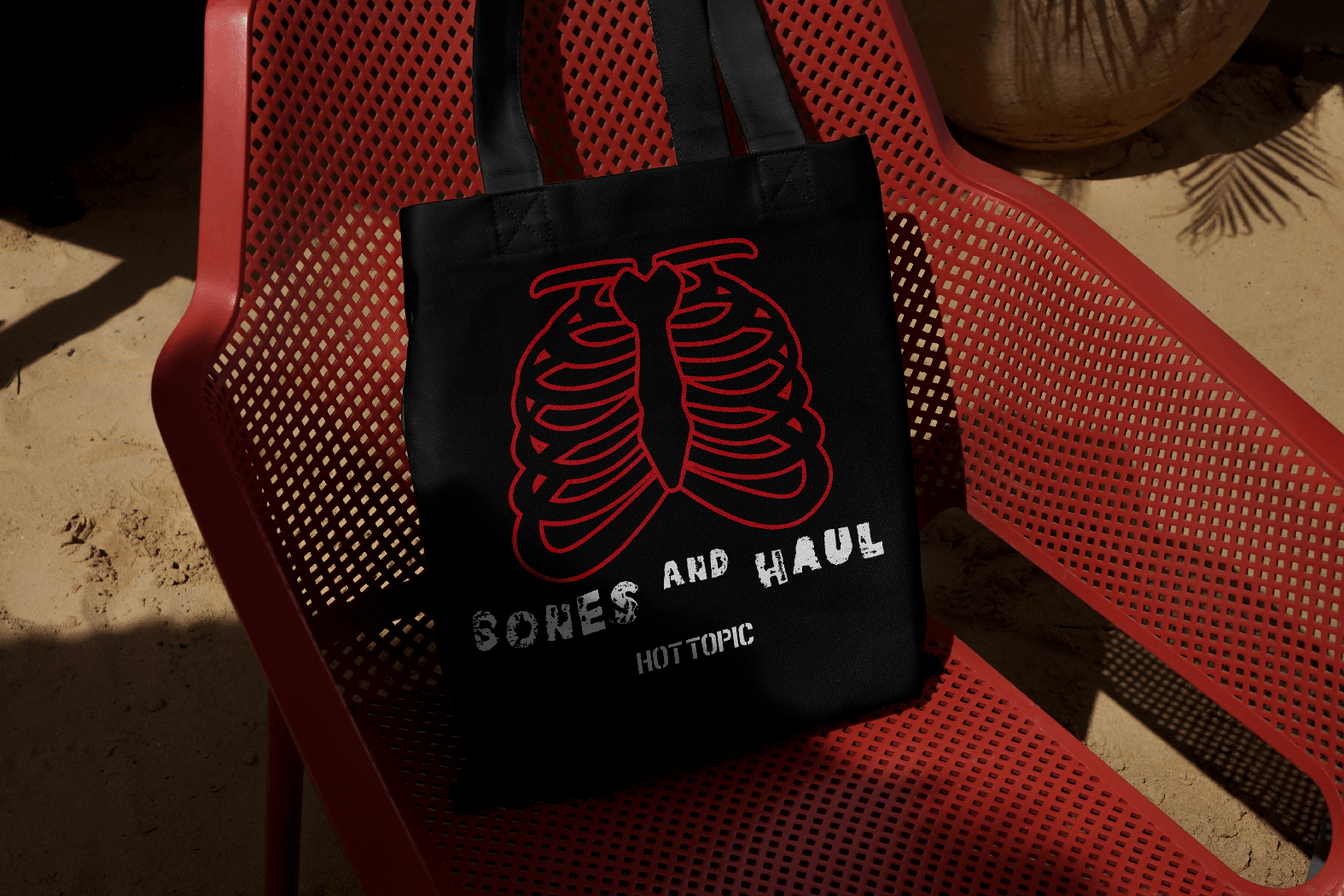 Free Canvas Bag on Plastic Chair Mockup.png