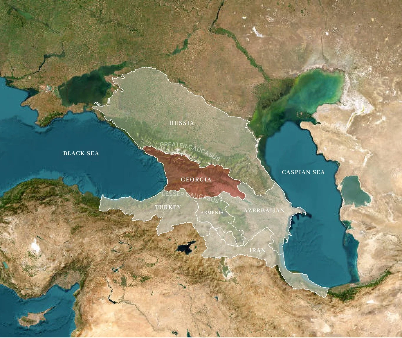 Map showing regions of Russia including Greater Caucasus and Lesser Caucasus, with neighboring countries Turkey, Armenia, Azerbaijan, Iran, and Georgia, surrounded by Black Sea and Caspian Sea.