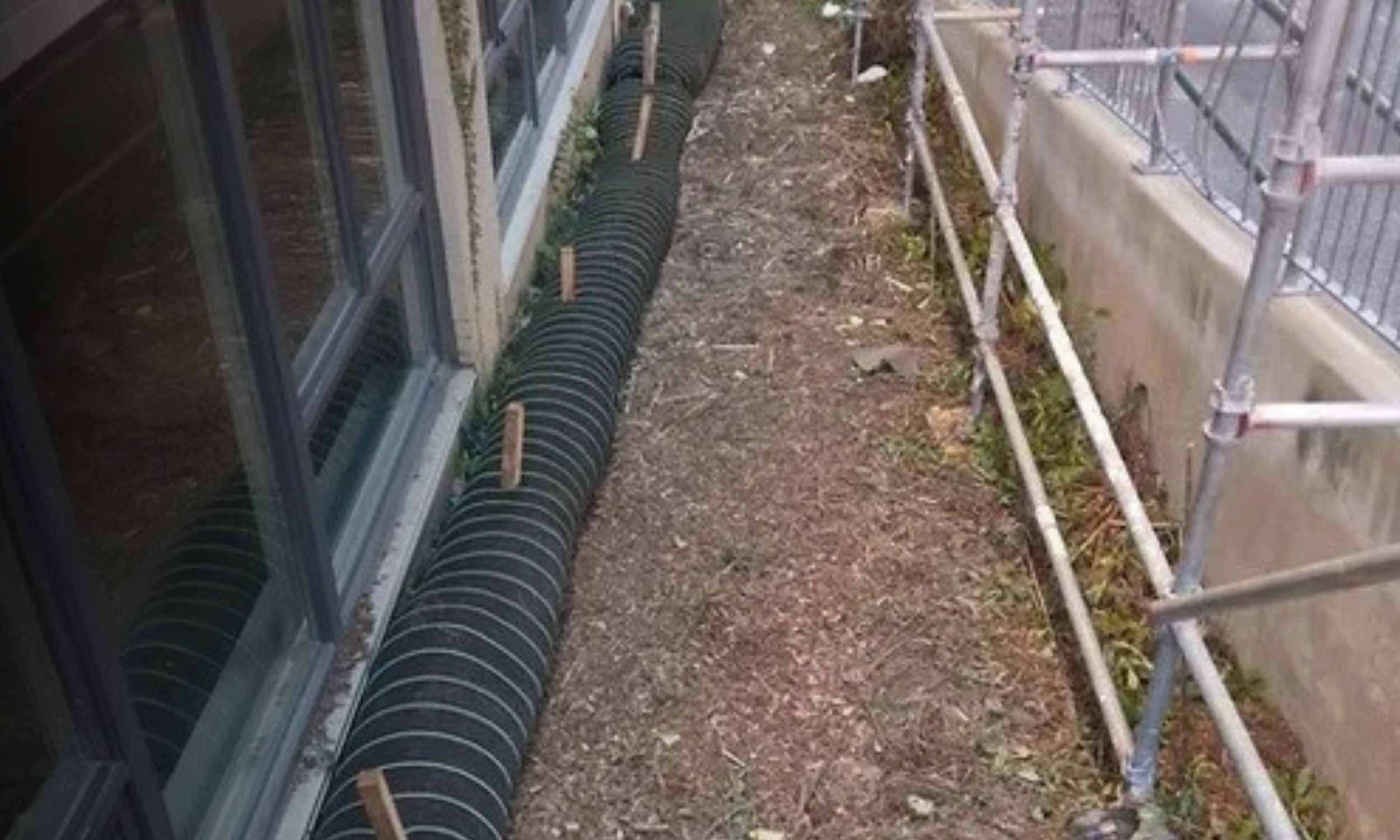 Filter sock installation for perimeter control to help prevent sediment runoff on a job site