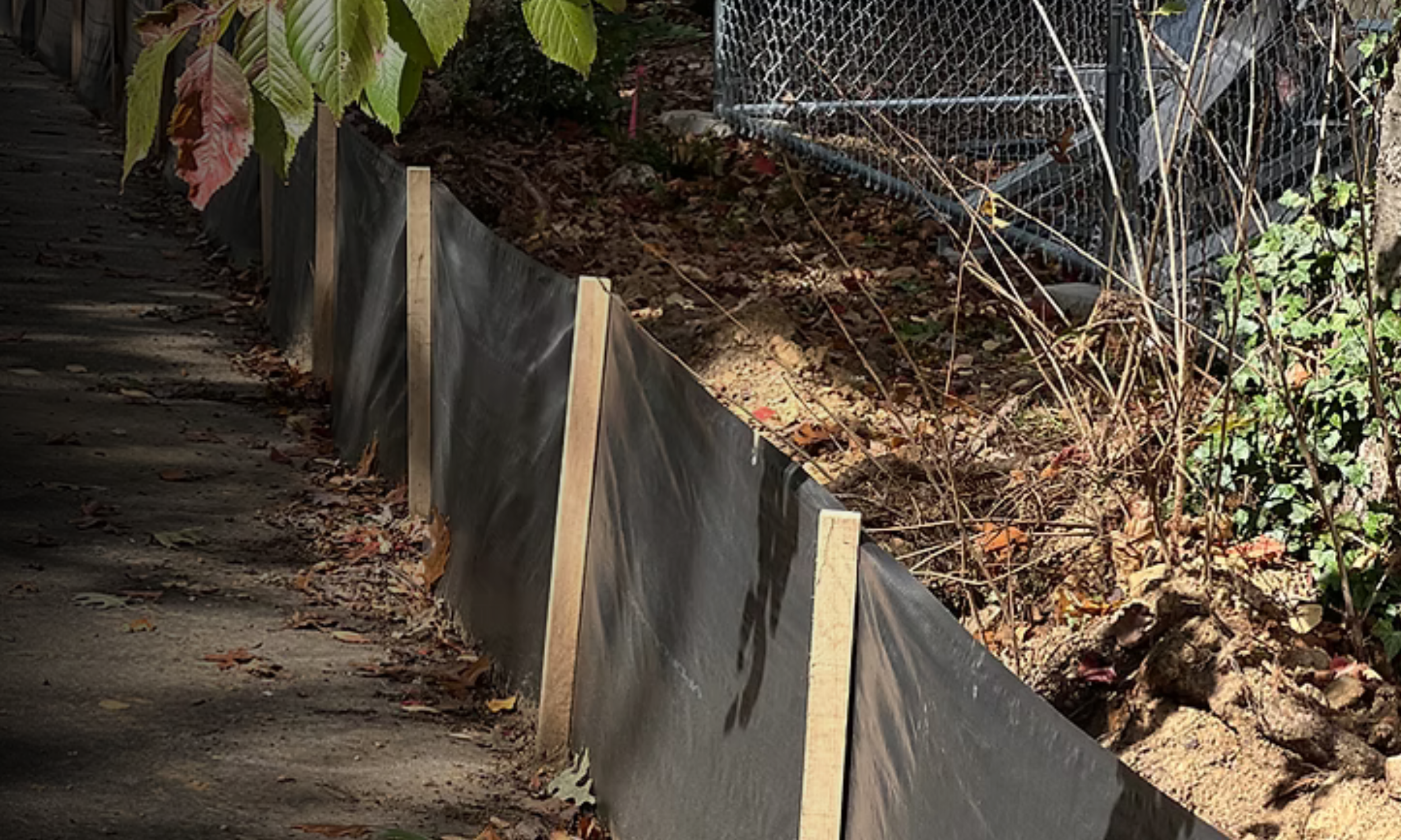 Silt fence installed for erosion and sediment control on a job site