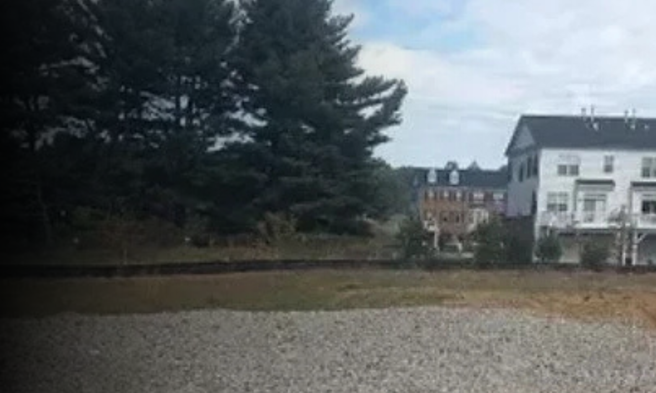 Stone construction entrance installed to reduce mud and dirt tracked onto public roads by construction vehicles