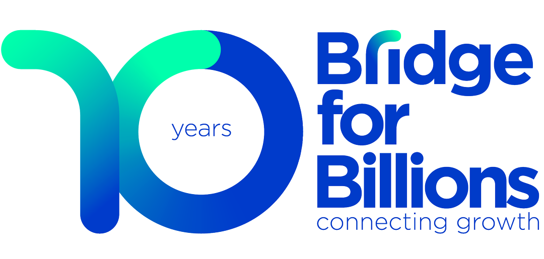 Logo celebrating 20 years of a company called Bridge for Billions, with the tagline 'connecting growth'.