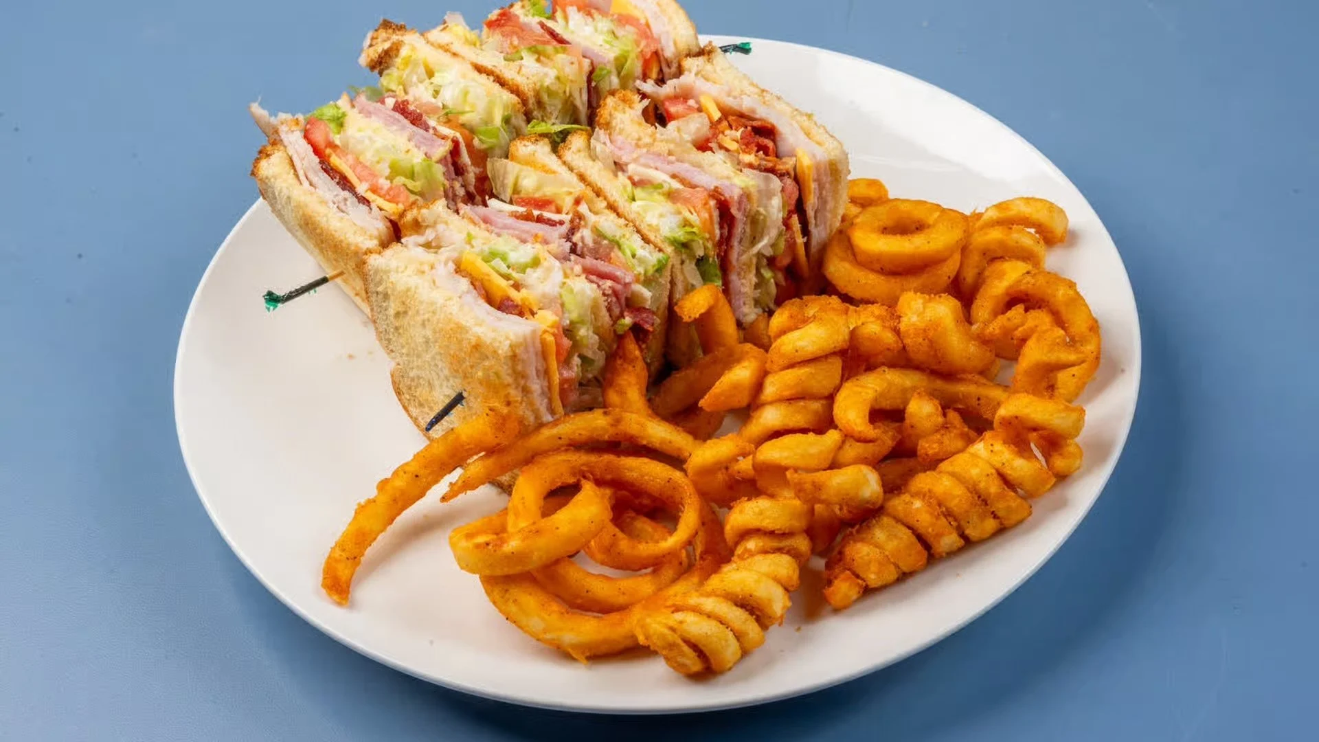 Rockhouse Deli Sandwich and Curly Fries