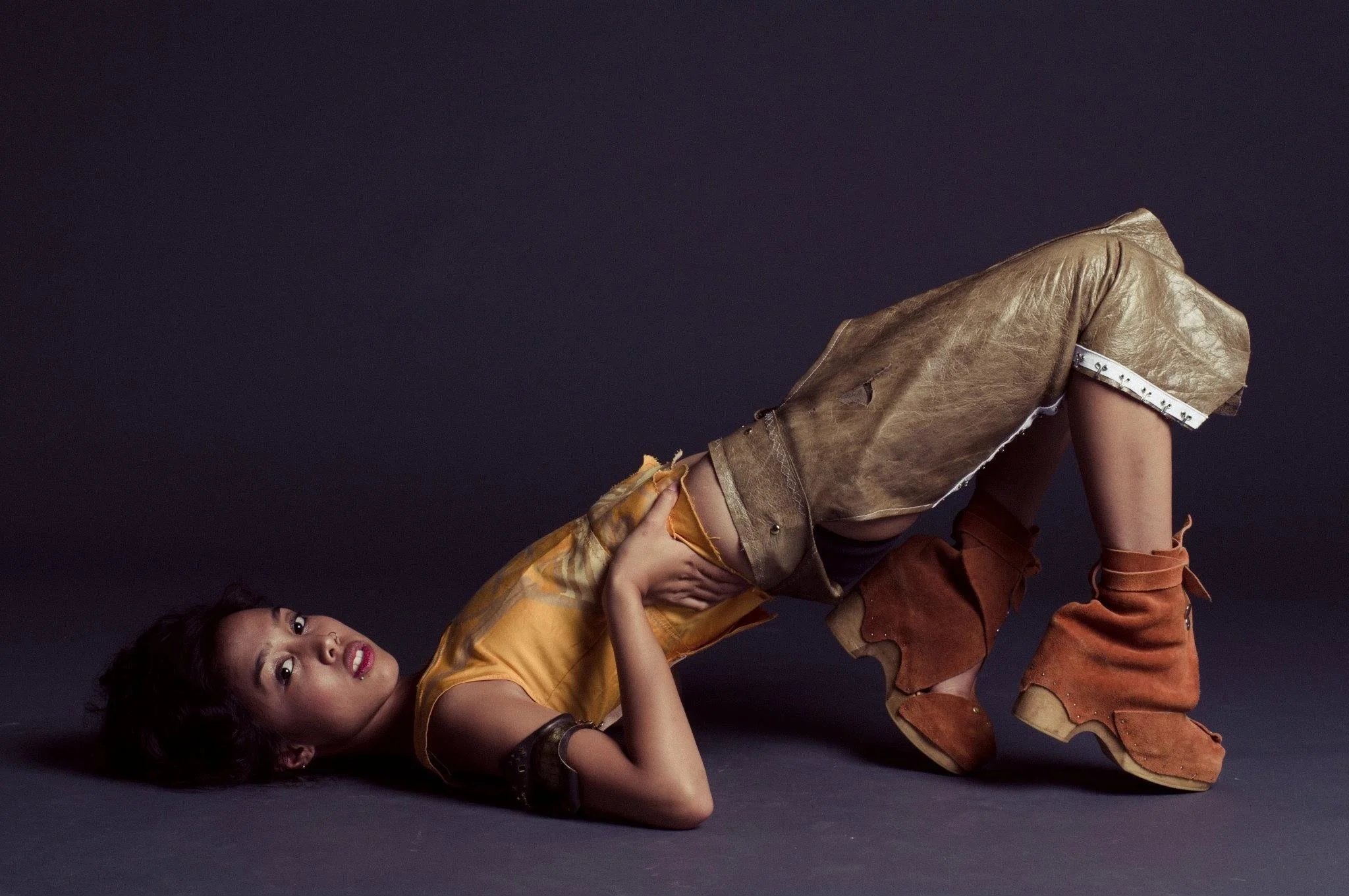 Miza G wearing custom cowgirl elctra shoes, top, and arm cuff. Photo by Tony Hall.