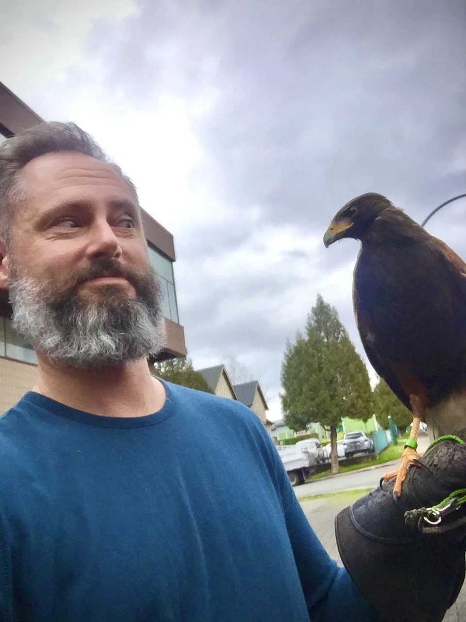Bobby Marsden on set with a hawk.