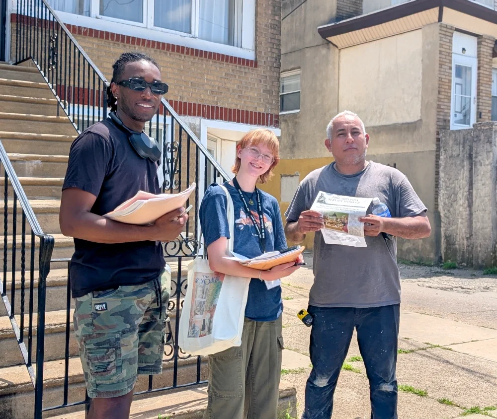 ESWA canvass team with 3 volunteers on a sunny day