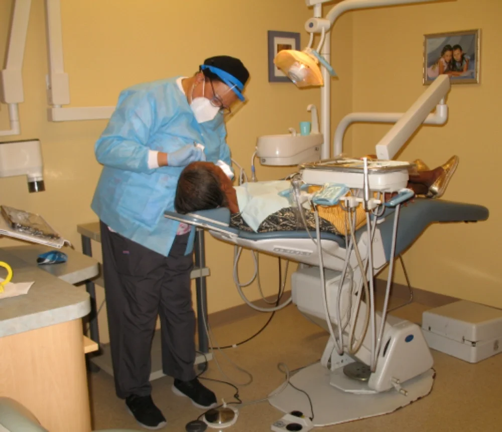 Volunteer dentist donates her time to provide preventive dental care to a member who does not have health care coverage and has no other means for treatment 
