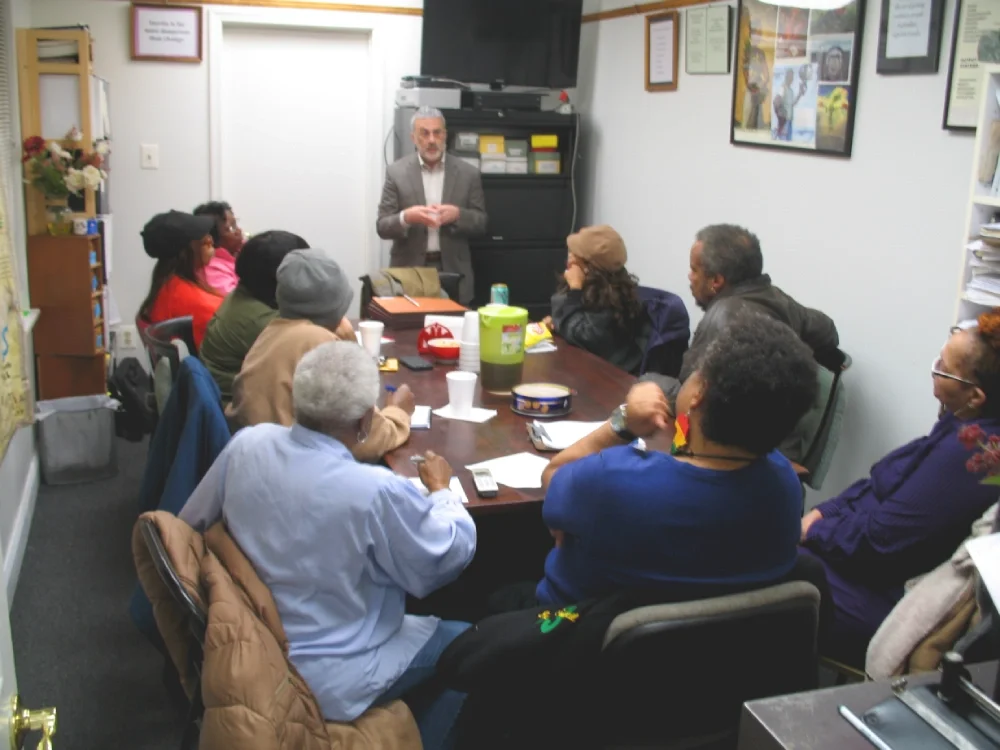 A volunteer attorney speaks at an ESWA  Know Your Law session on topics of interest to members