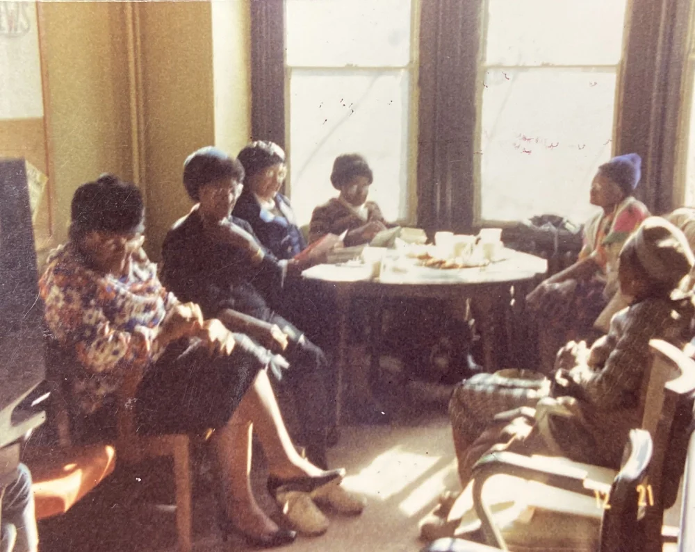 A group of members meeting on conditions of their work as home health workers