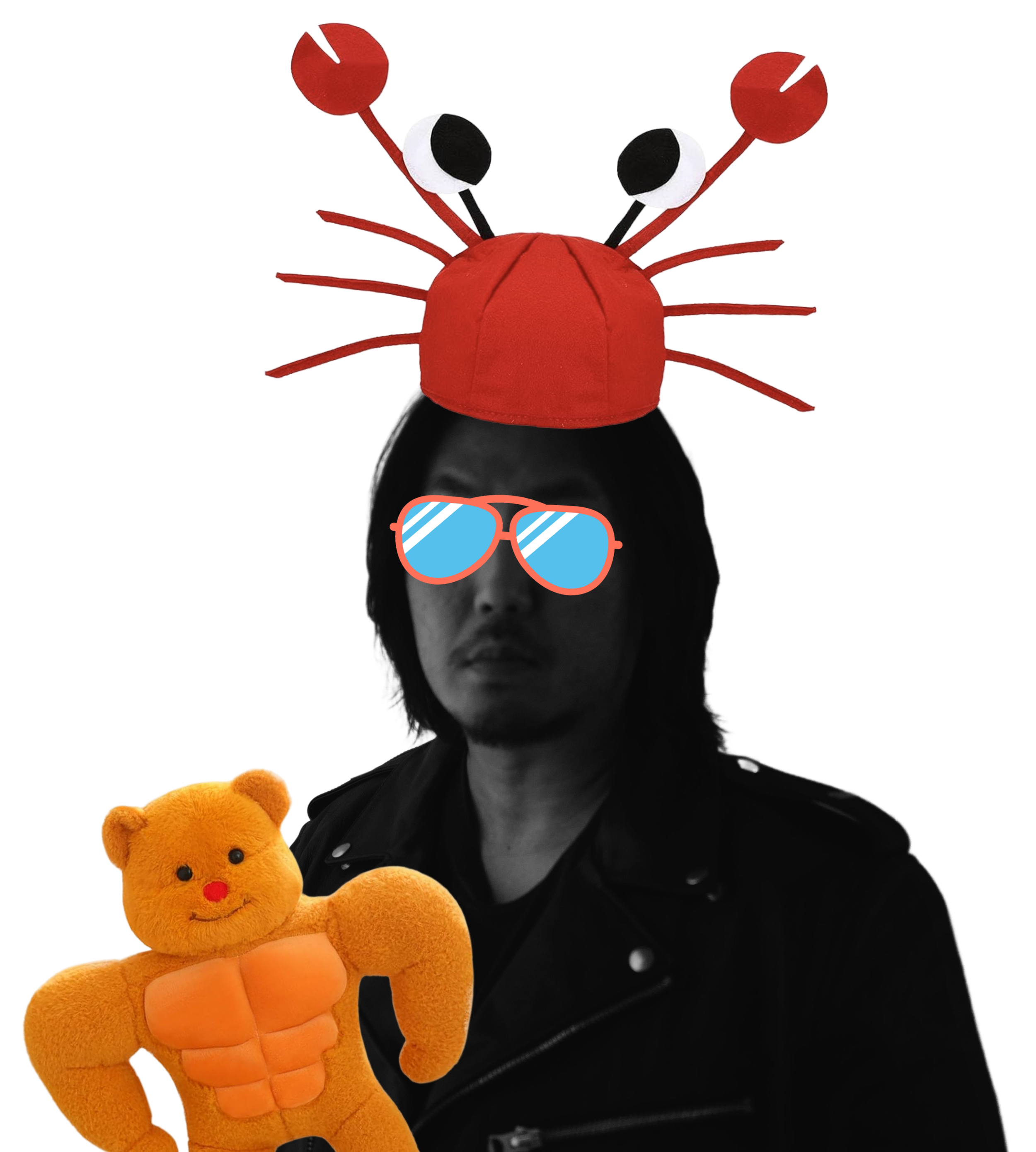 Person wearing a black jacket with orange sunglasses, with a cartoon sun hat shaped like a red crab and holding a plush orange bear with a muscular chest and smiling face.
