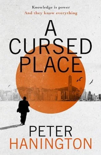 Book cover of 'A Cursed Place' by Peter Hanington featuring a silhouette of a man walking toward a city skyline with an orange sun or moon in the background and a seagull flying.