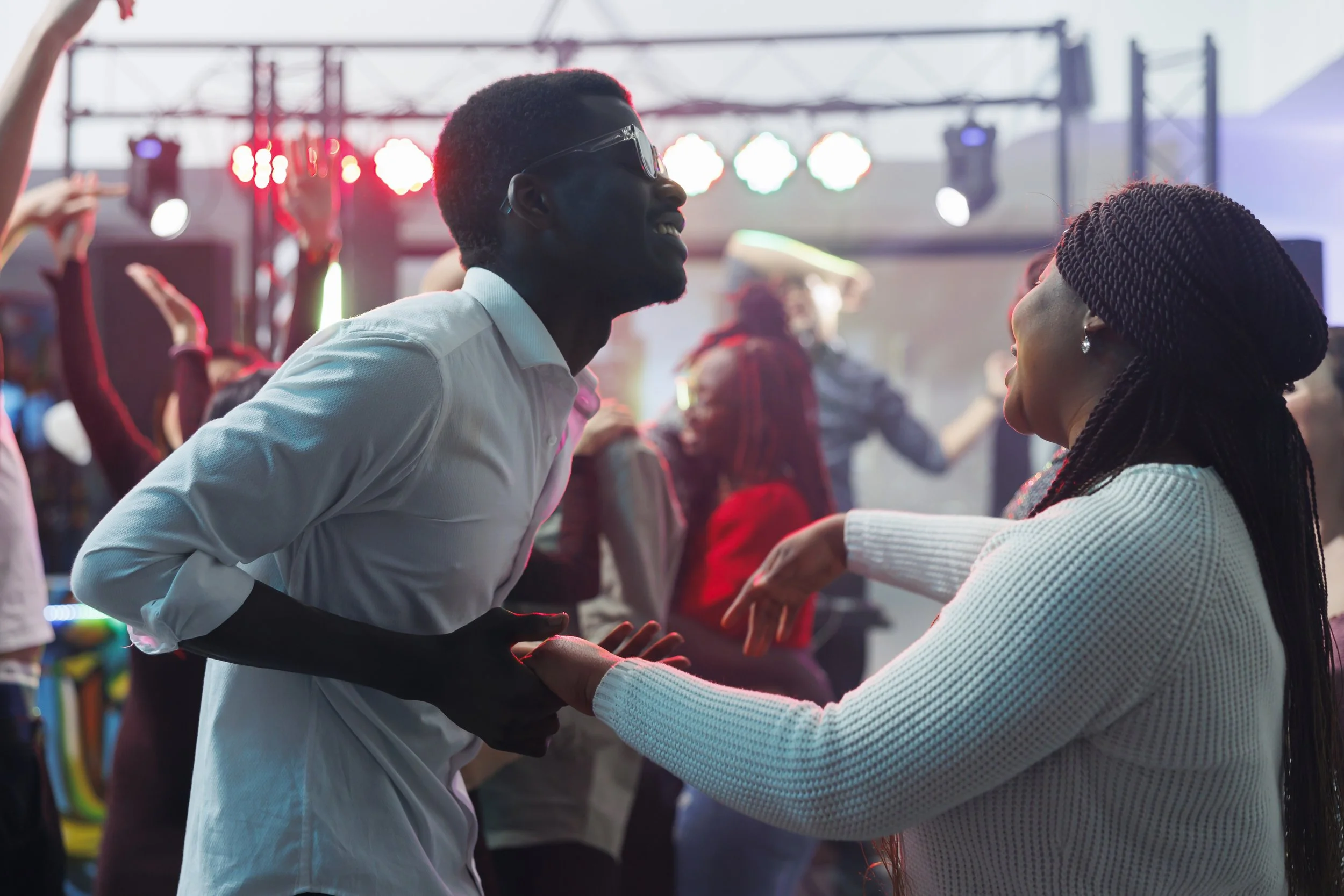 vecteezy_carefree-african-american-couple-dancing-together-and-having_31408202.jpg