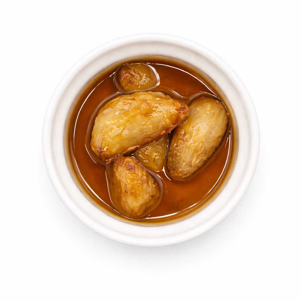Bowl of chicken in brown gravy