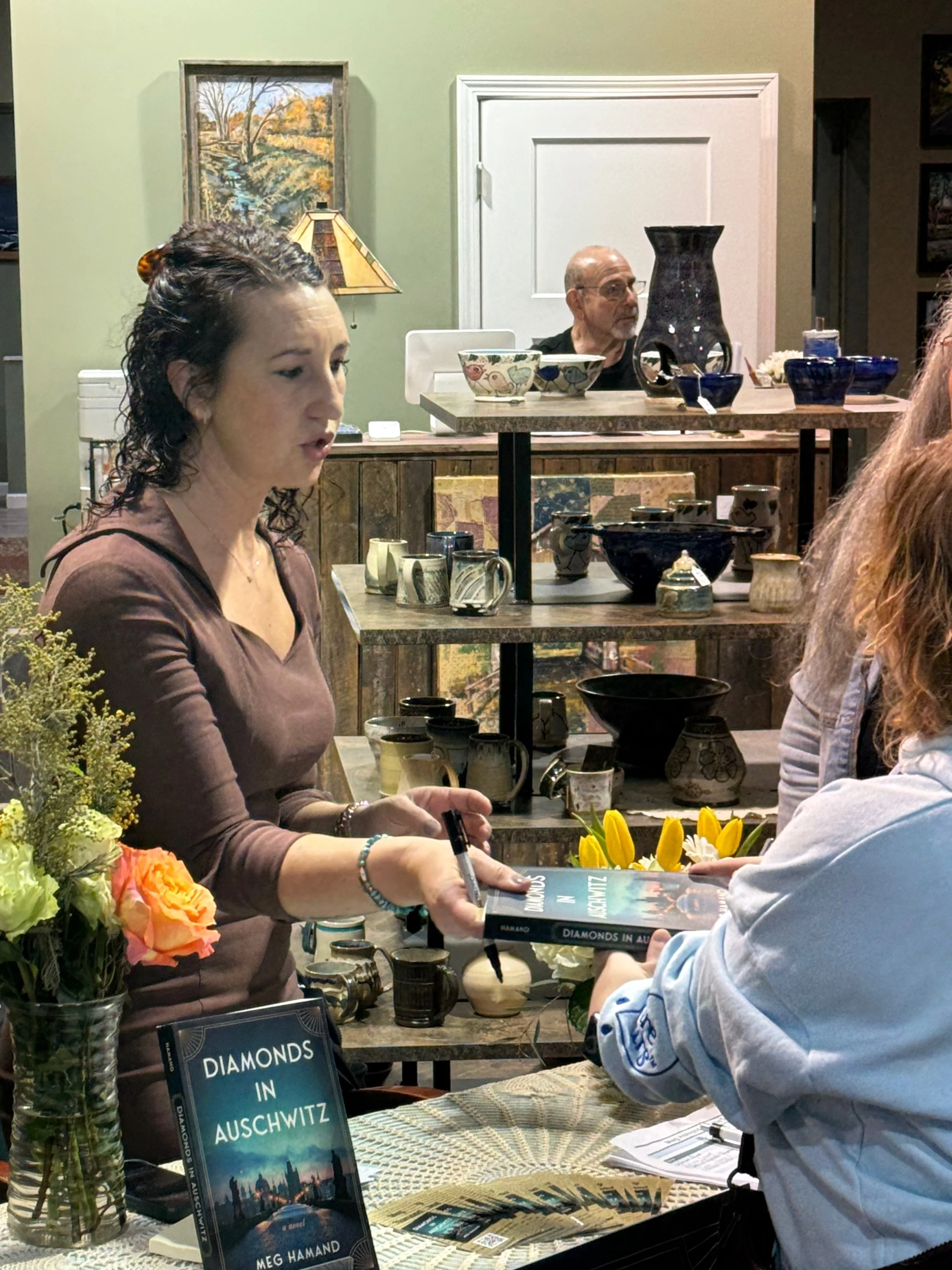 In Diamonds in Auschwitz, debut author Meg Hamand shares a touching story of love and strength during World War II. This historical fiction follows an engagement ring as it moves among people affected by the Holocaust. 