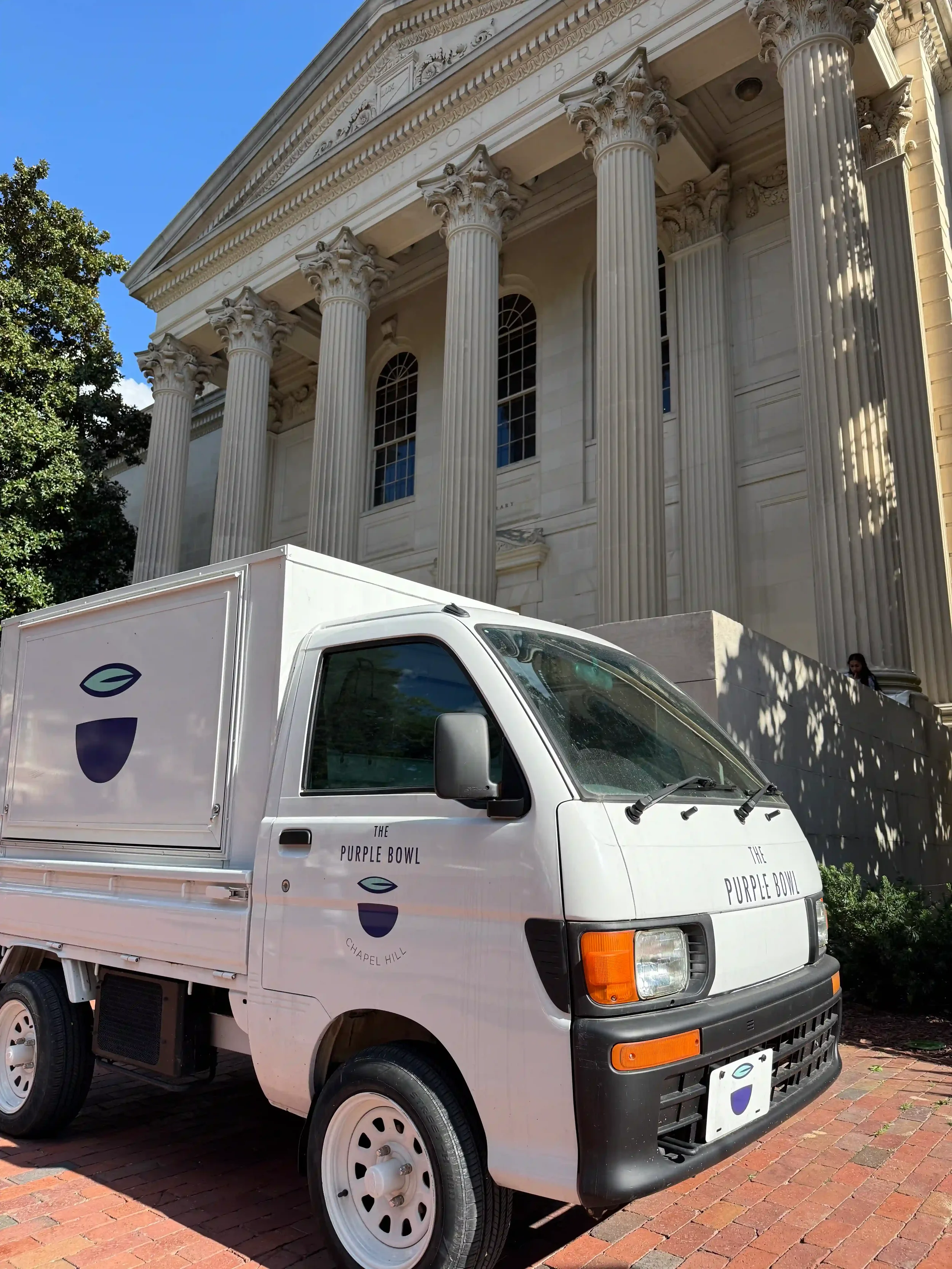 The Purple Bowl truck in front of Wilson Library at UNC Chapel Hill