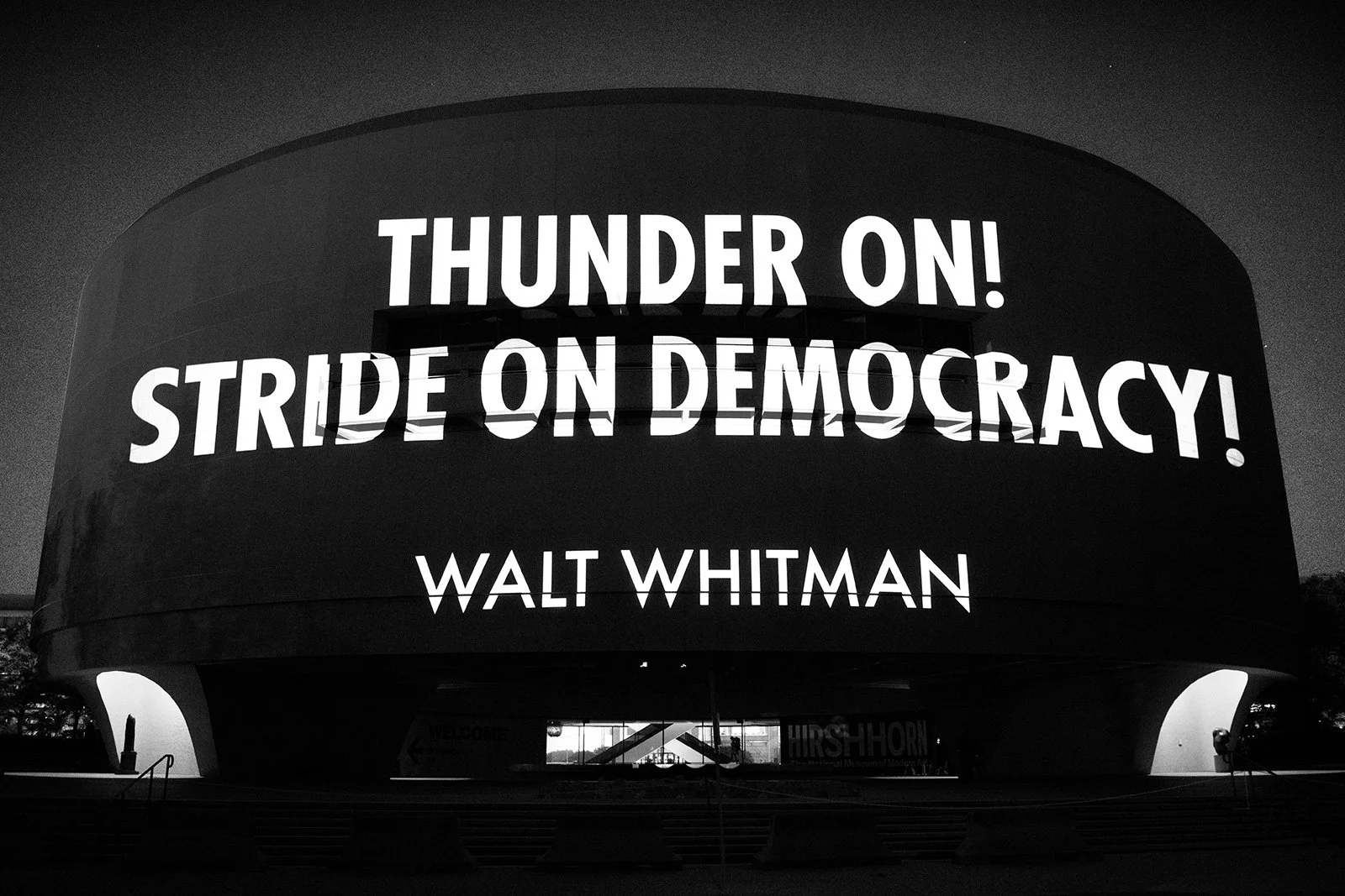 THE PEOPLE, 2023
Light projection
Hirshhorn Museum and Sculpture Garden, Washington, DC
Text: “Rise, O Days, from Your Fathomless Deeps” from Drum-Taps by Walt Whitman, 1865.
© 2023 Jenny Holzer, member Artists Rights Society (ARS), NY
Photo: Ray Alv