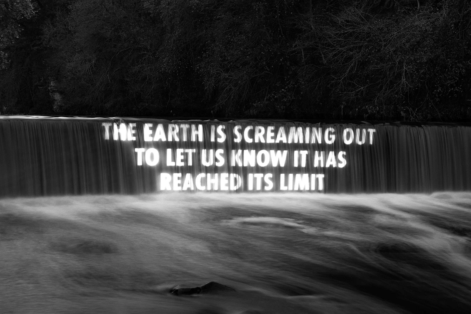 HURT EARTH, 2021
Light projection
Cramond Falls, Edinburgh, Scotland
Text: Chris Van Hollen, statement during US House session,Washington, DC, March 12, 2019.
© 2021 Jenny Holzer, member Artists Rights Society (ARS), NY
Photo: Ryan Buchanan