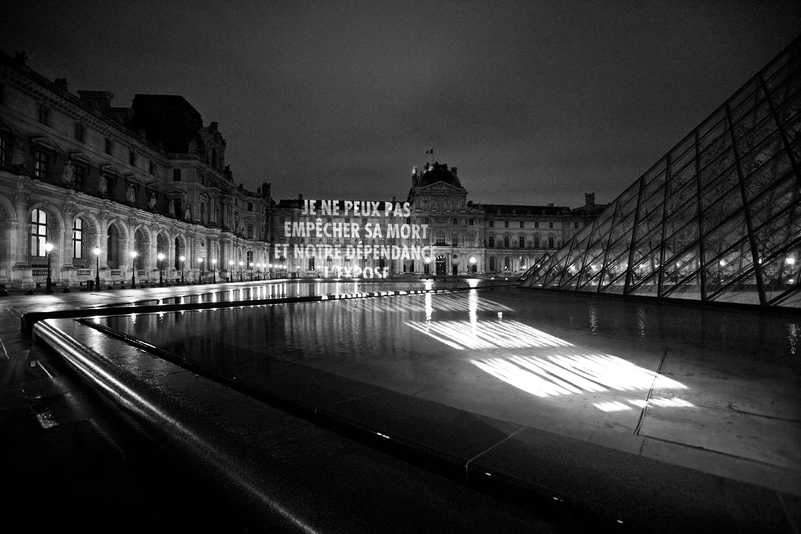 Site: Louvre Pyramid, Napoleon Courtyard, Paris
April 7–10, 2009
Text: Mother and Child, 1990
Projection: FX Productions; Charles Passarelli
Photo: Lili Holzer-Glier
Collection, National Contemporary Art Fund, Paris