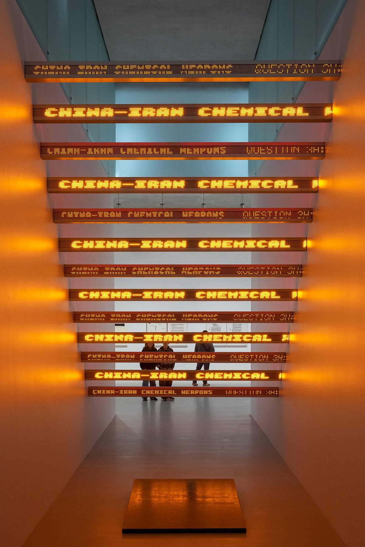 Red Yellow Looming, 2004
13 LED signs with amber and red diodes
5.25 x 109 x 4 in. / 13.3 x 276.9 x 10.2 cm
Text: US government documents

Terrorism, 2023-24
24k gold, black oxide silver, moon gold and red gold leaf and oil on linen
58 x 44 in. / 147