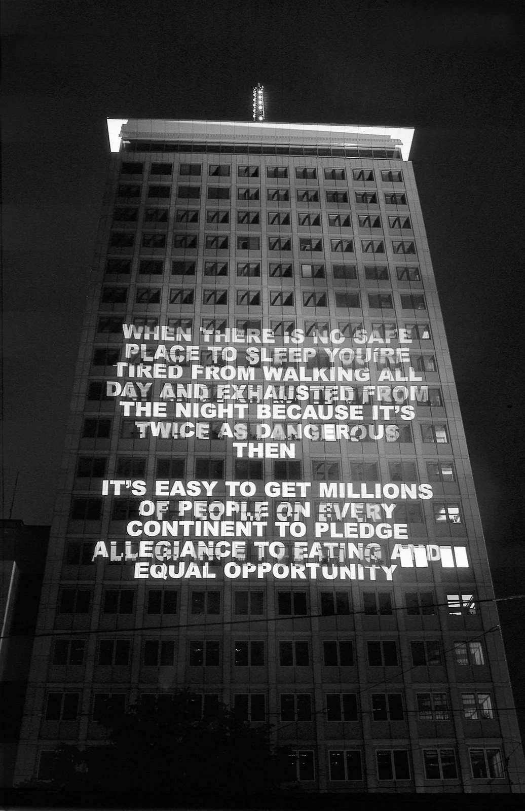 Site: Ringturm, Vienna, Austria
October 11, 1998
Text: Survival, 1983–85
Projection: Skypictures; Aubert Lee
Photo: Christian Wachter