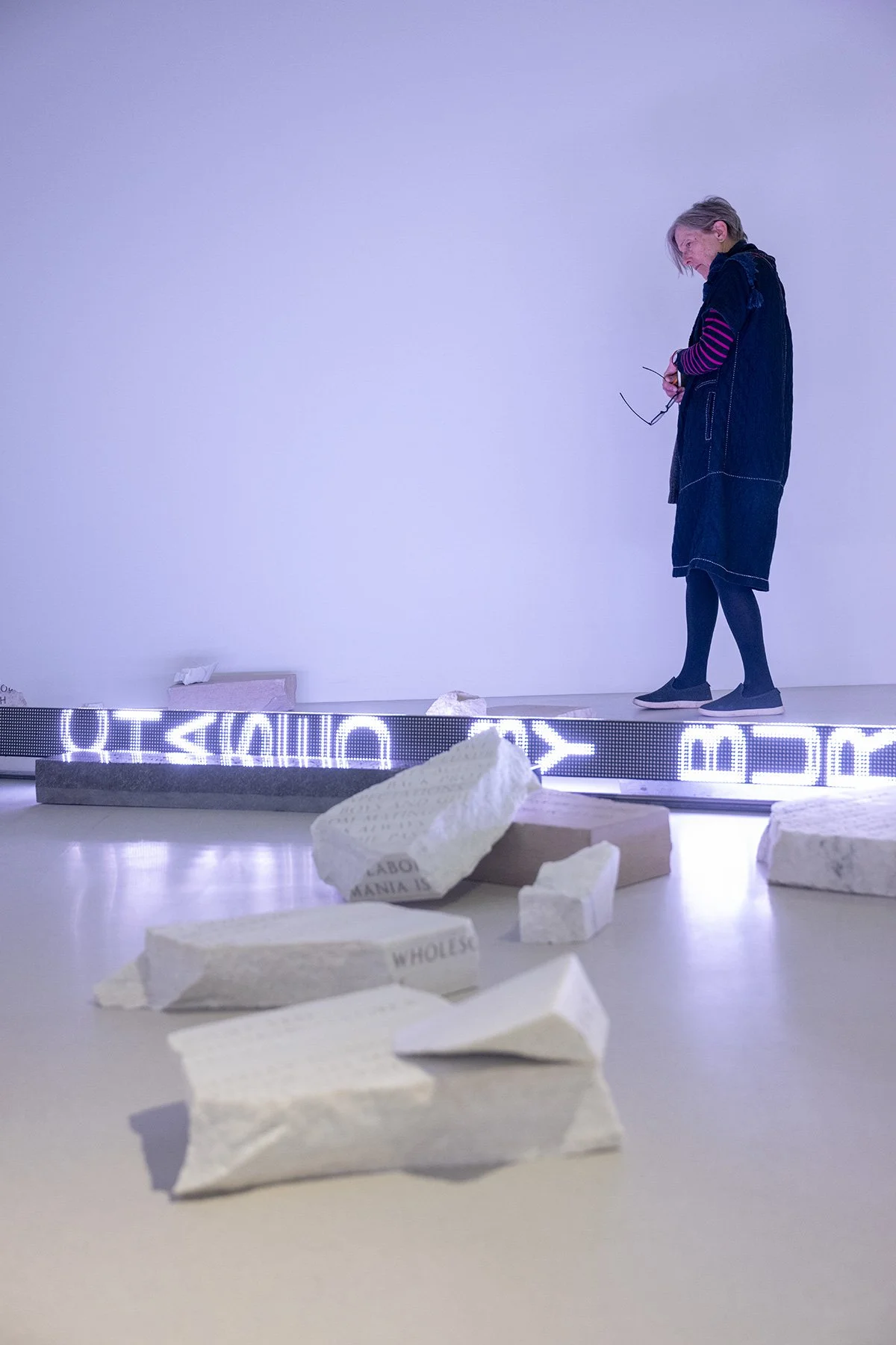 Broken, 2025 (detail) 
Broken granite, limestone and marble benches

Ram, 2016 (detail) 
LED with blue, green, and red diodes
5.5 x 300 x 5.5 in. / 14 x 762 x 14 cm
Text: “A Messenger” from Building the Barricade by Anna Świrszczyńska, English transl