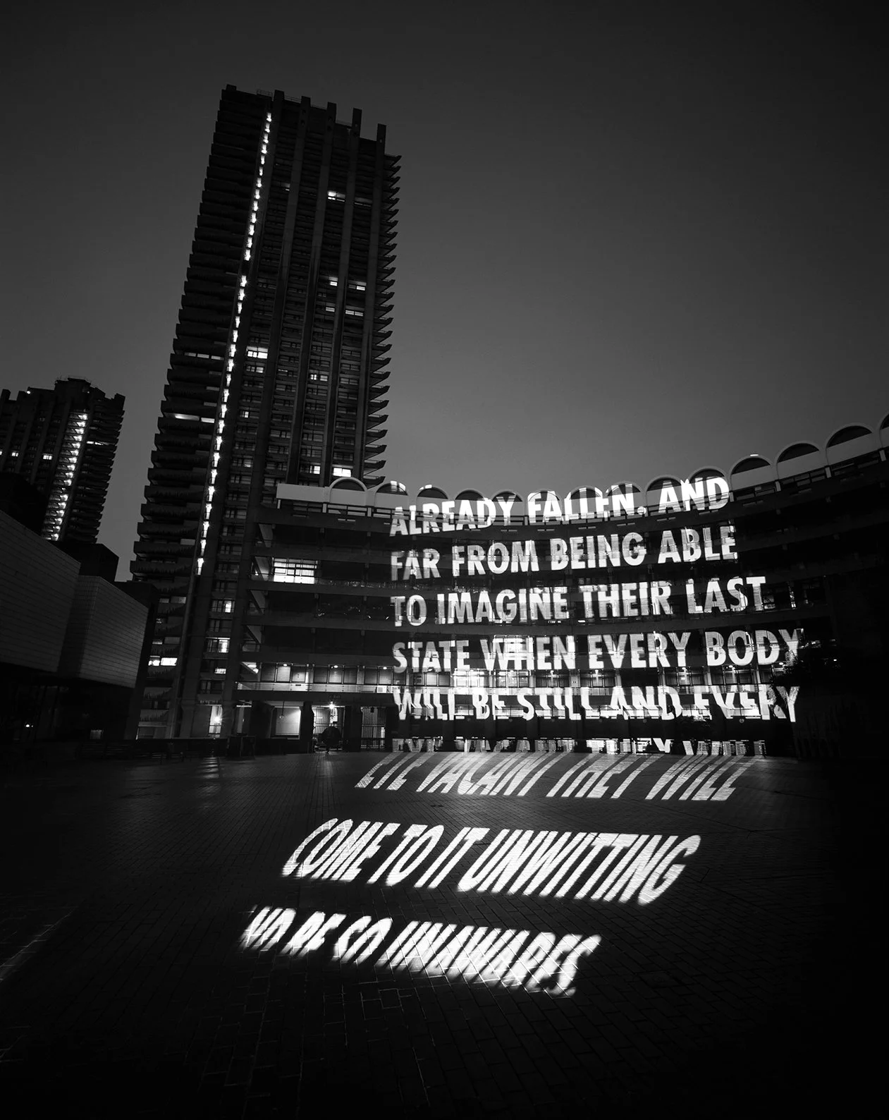 Site: Barbican Sculpture Court, London
April 12, 2006
Text: The Lost Ones by Samuel Beckett. Published by Calder Publications London.
Projection: FX Productions; Charles Passarelli
Photo: Attilio Maranzano