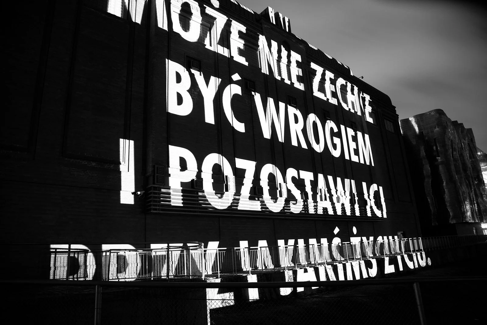 Site: Old Brewery, Poznan, Poland
April 8, 2011
Text: “Jacyś ludzie” by Wisława Szymborska. Used/reprinted with permission of the author.
Projection: FX Productions; Charles Passarelli
Photo: Bartek Buśko