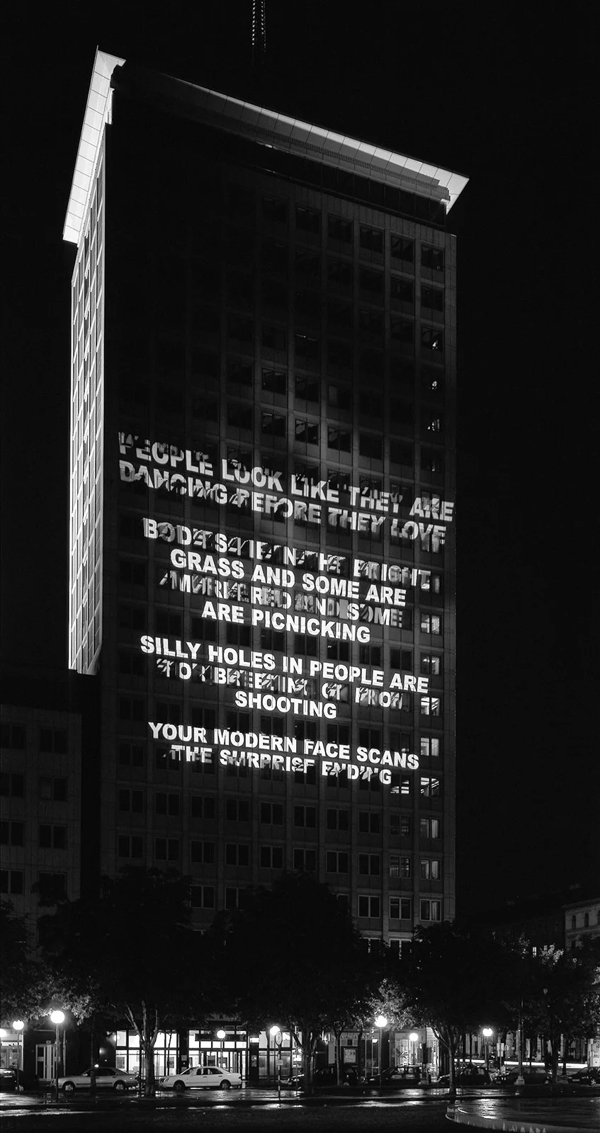 Site: Ringturm, Vienna, Austria
October 11, 1998
Text: Survival, 1983–85
Projection: Skypictures; Aubert Lee
Photo: Christian Wachter