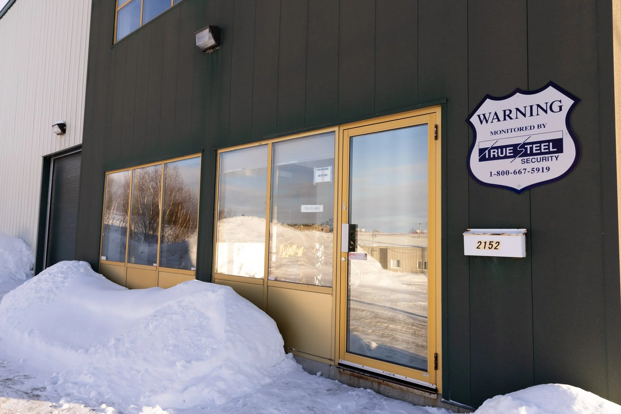 Front entrance of Available Storage building in South End Sudbury offering many sizes of storage units both unheated and heated as well as outdoor storage.