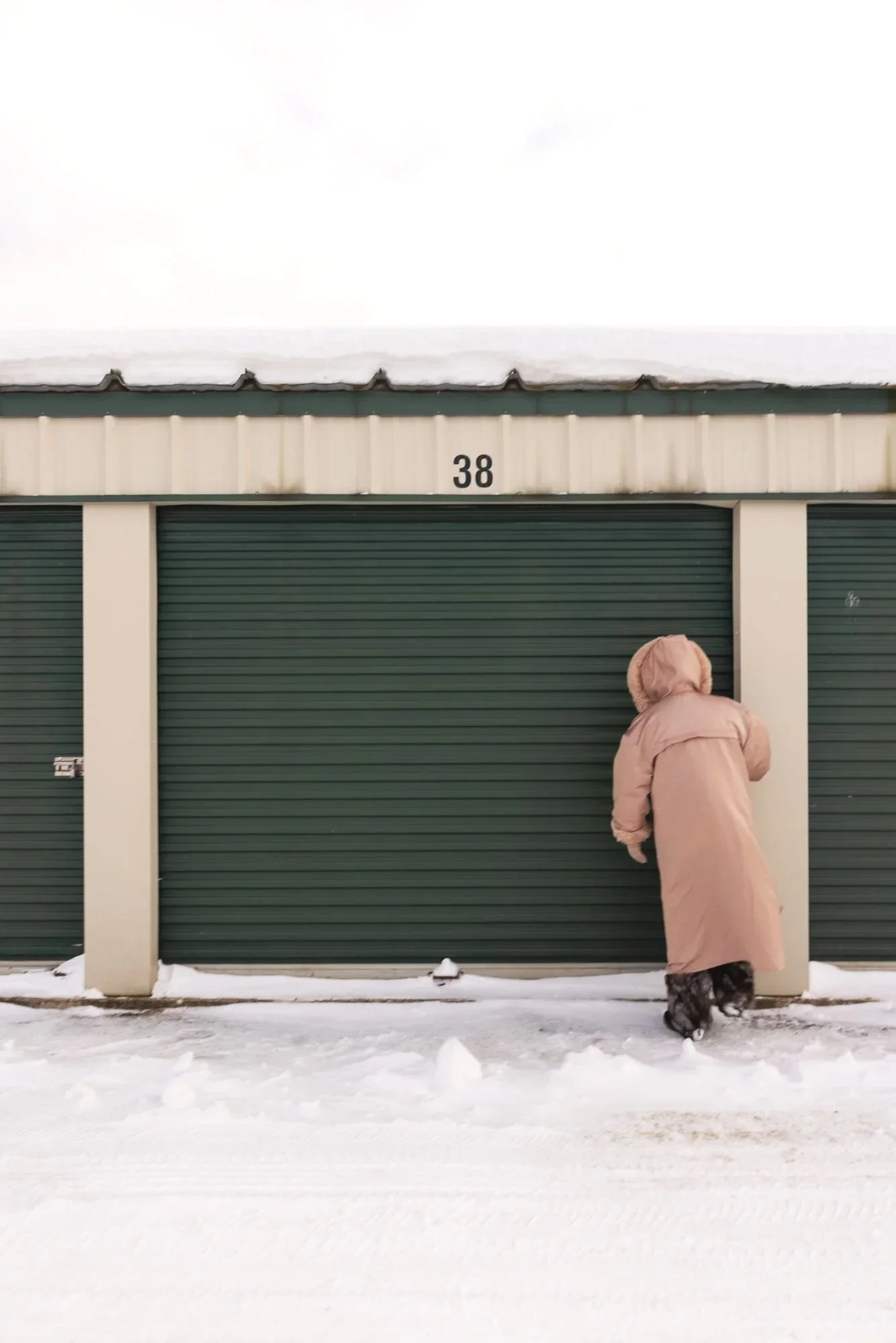 Someone opening an affordable unheated storage unit at Available Storage in the South End of Sudbury