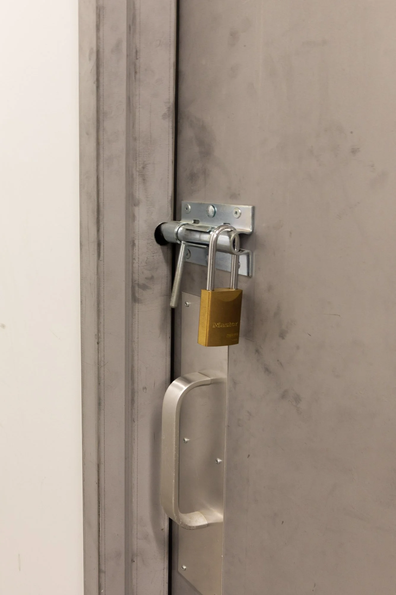 Close up of a locked indoor heated storage unit at Available Storage