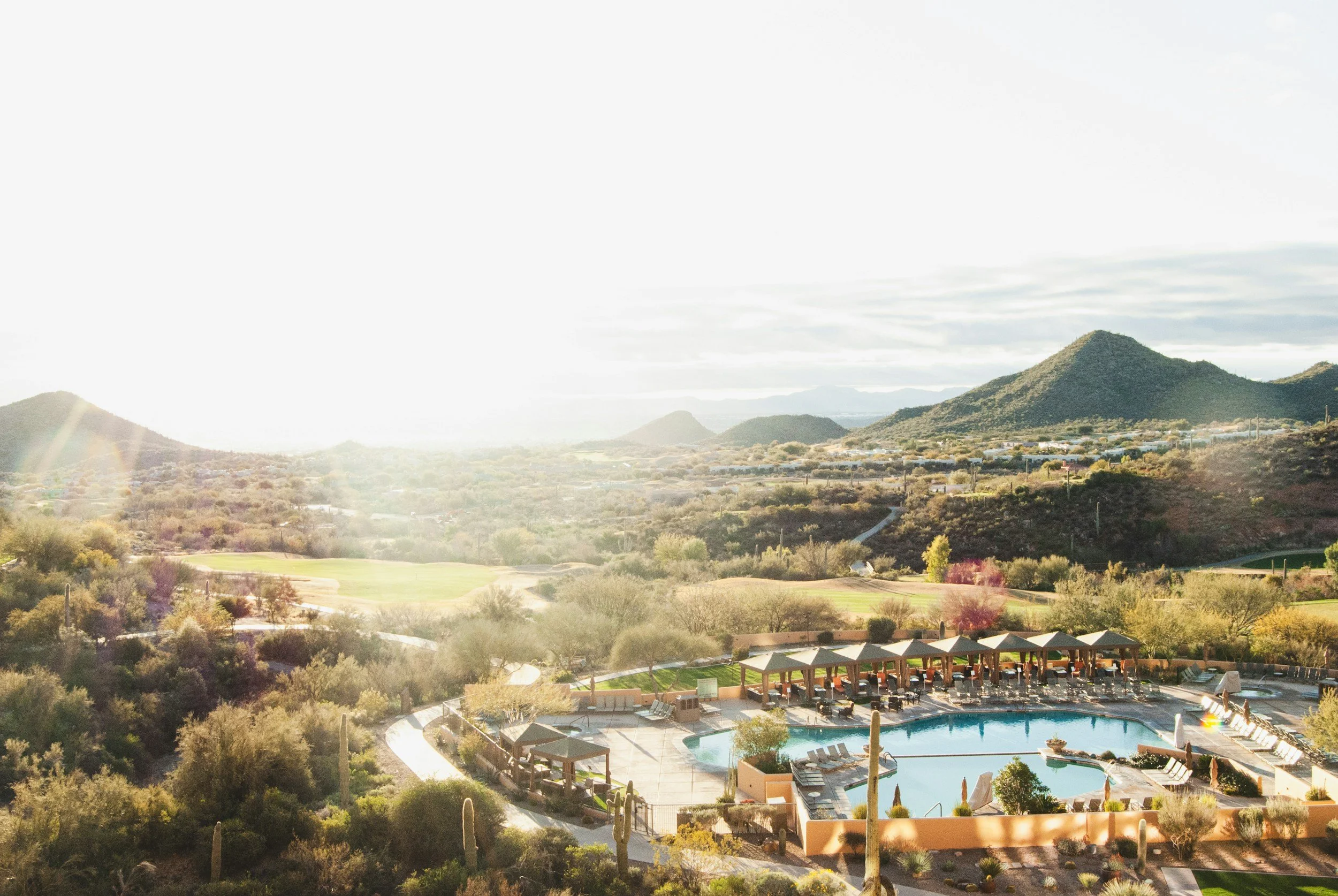 Luxury desert resort in Phoenix, Arizona with pool and mountain views—warm weather U.S. getaway.