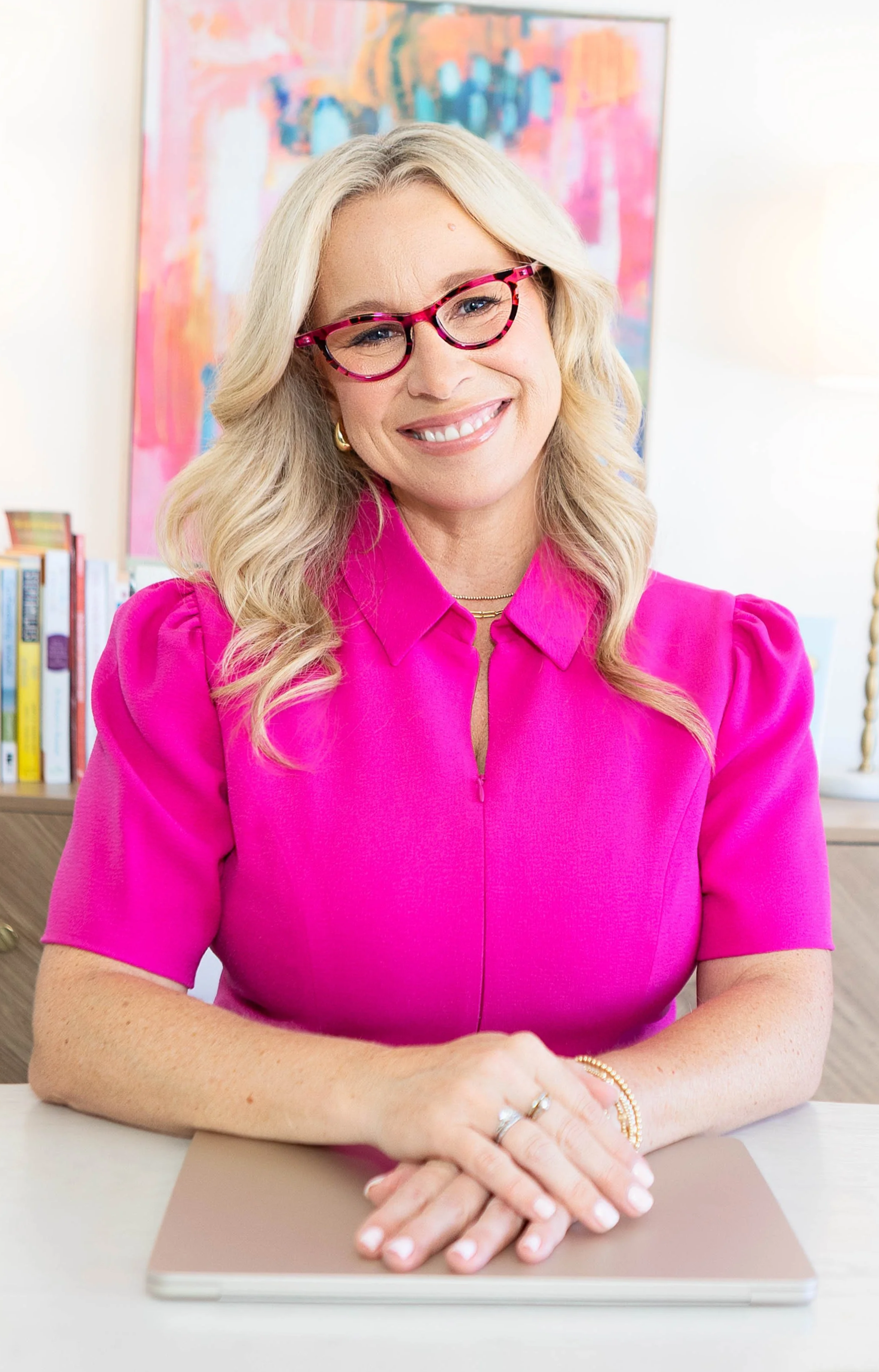 Andrea Hipps, relationship conflict coach, smiling in a natural light setting