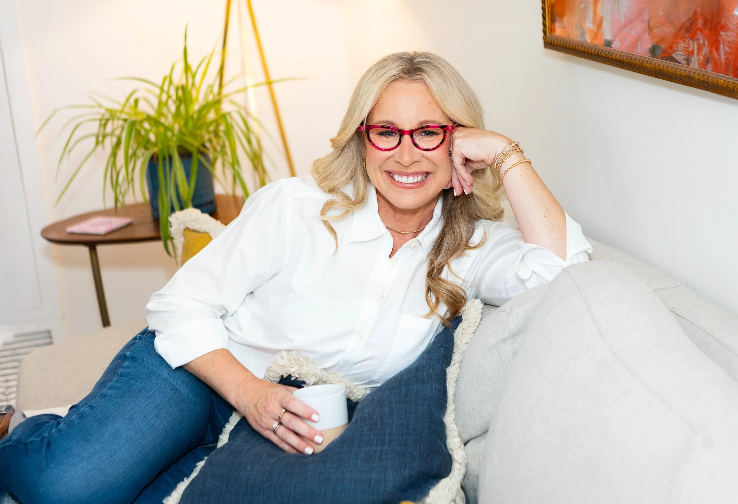 Andrea Hipps, relationship coach, photographed in a warm and approachable setting