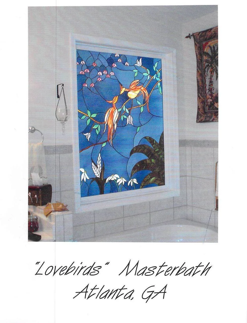 Colorful stained glass window titled 'Lovebirds' in a master bath in Atlanta, Georgia.