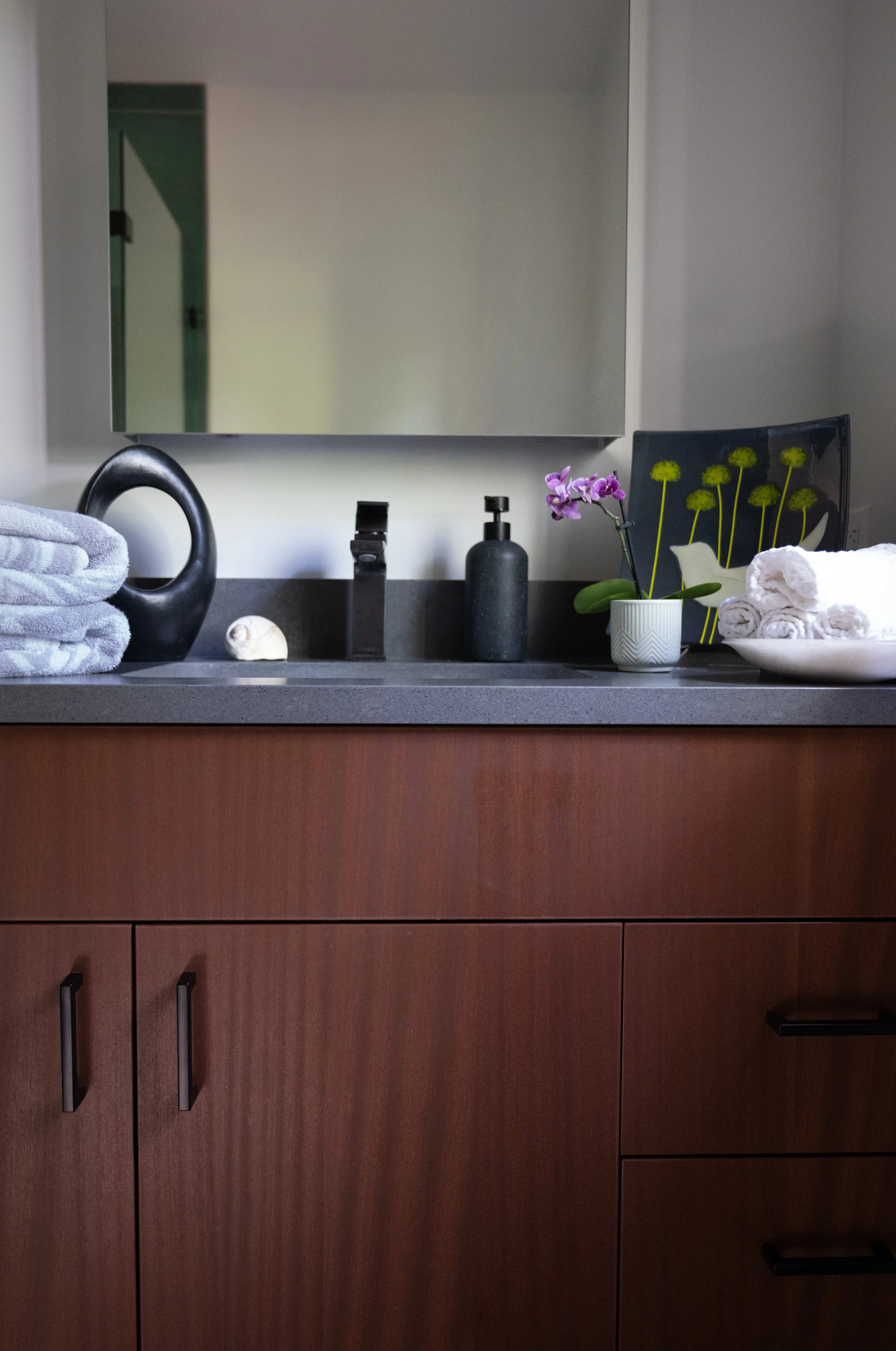 Interior image of bathroom vanity of Maitri Guest House