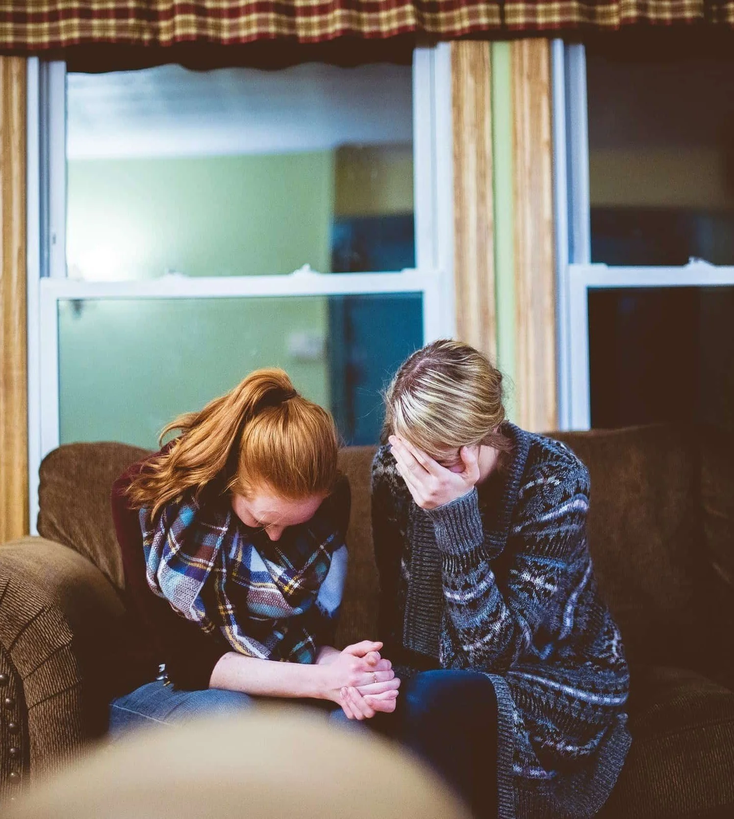 Women sitting on couch 