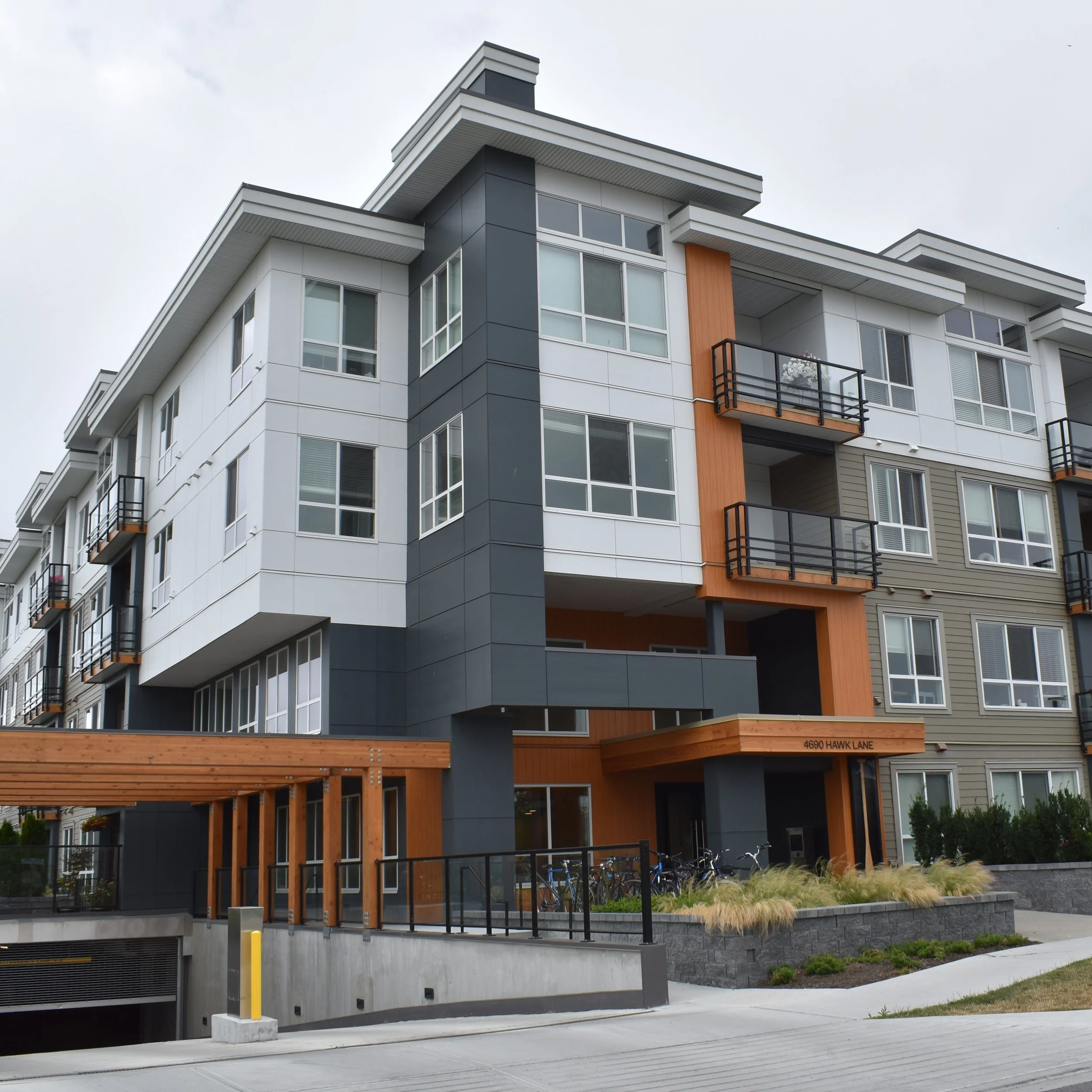 Mid-rise exterior cladding project in West Vancouver using cementitious panels and siding by L2 Group