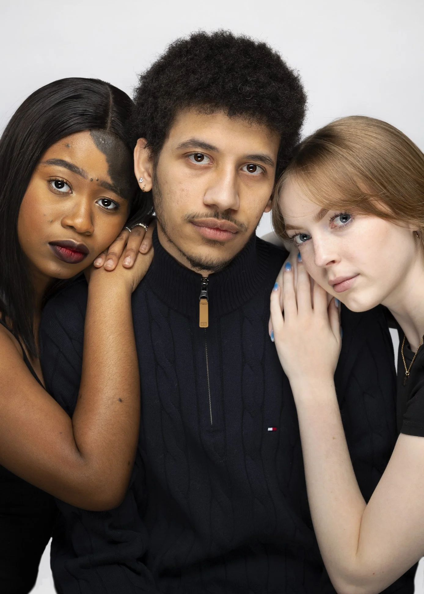 fashion/editorial photograph with three models