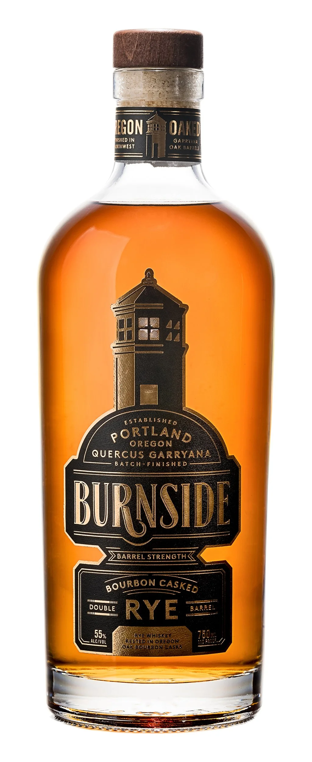 Bottle of Burnside bourbon cask rye whiskey with a black and gold label featuring a lighthouse illustration, Portland Oregon, established 2019.