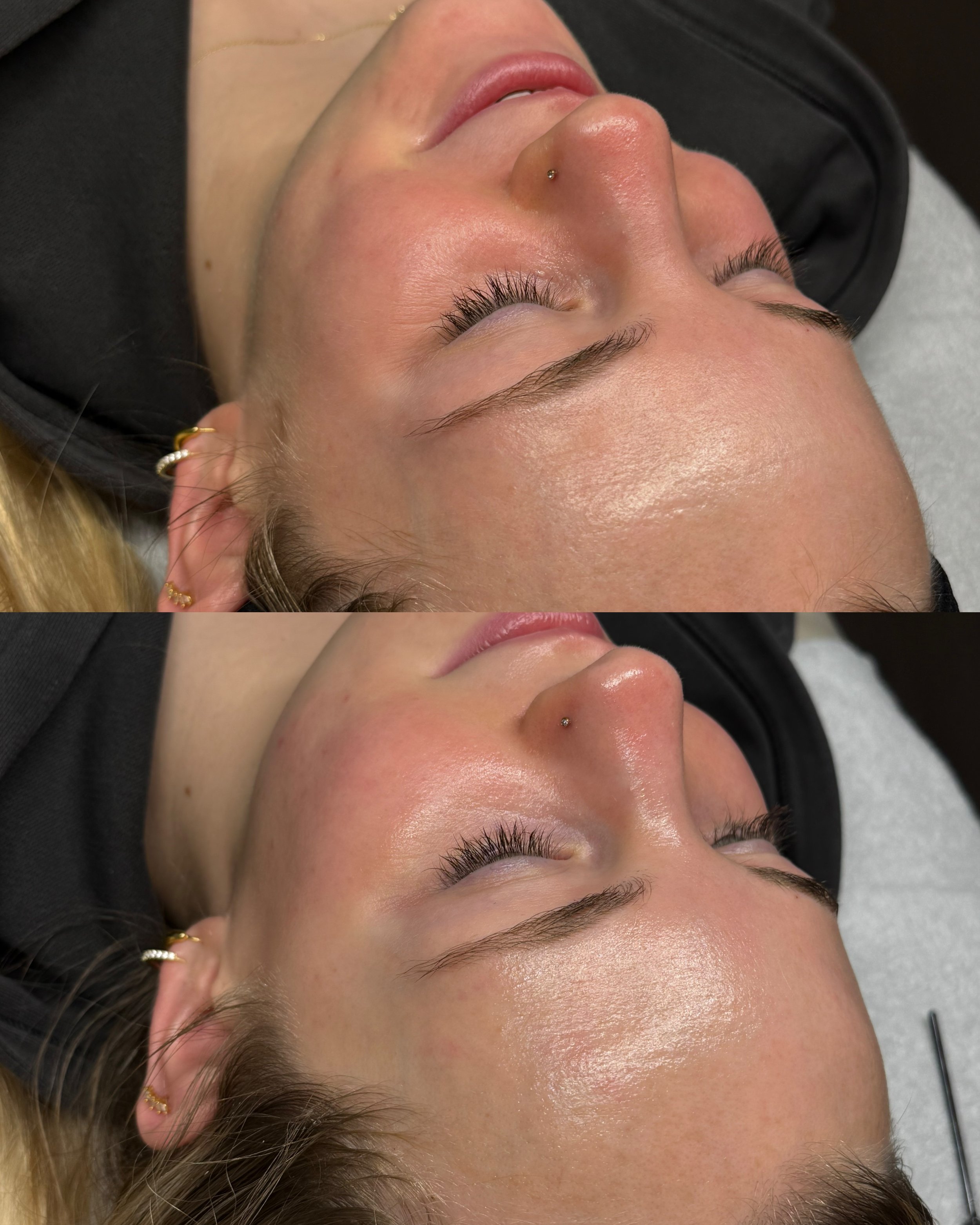 Close-up of a woman's face lying down with eyes closed, showing eyelash extensions, a nose piercing, and gold earrings.