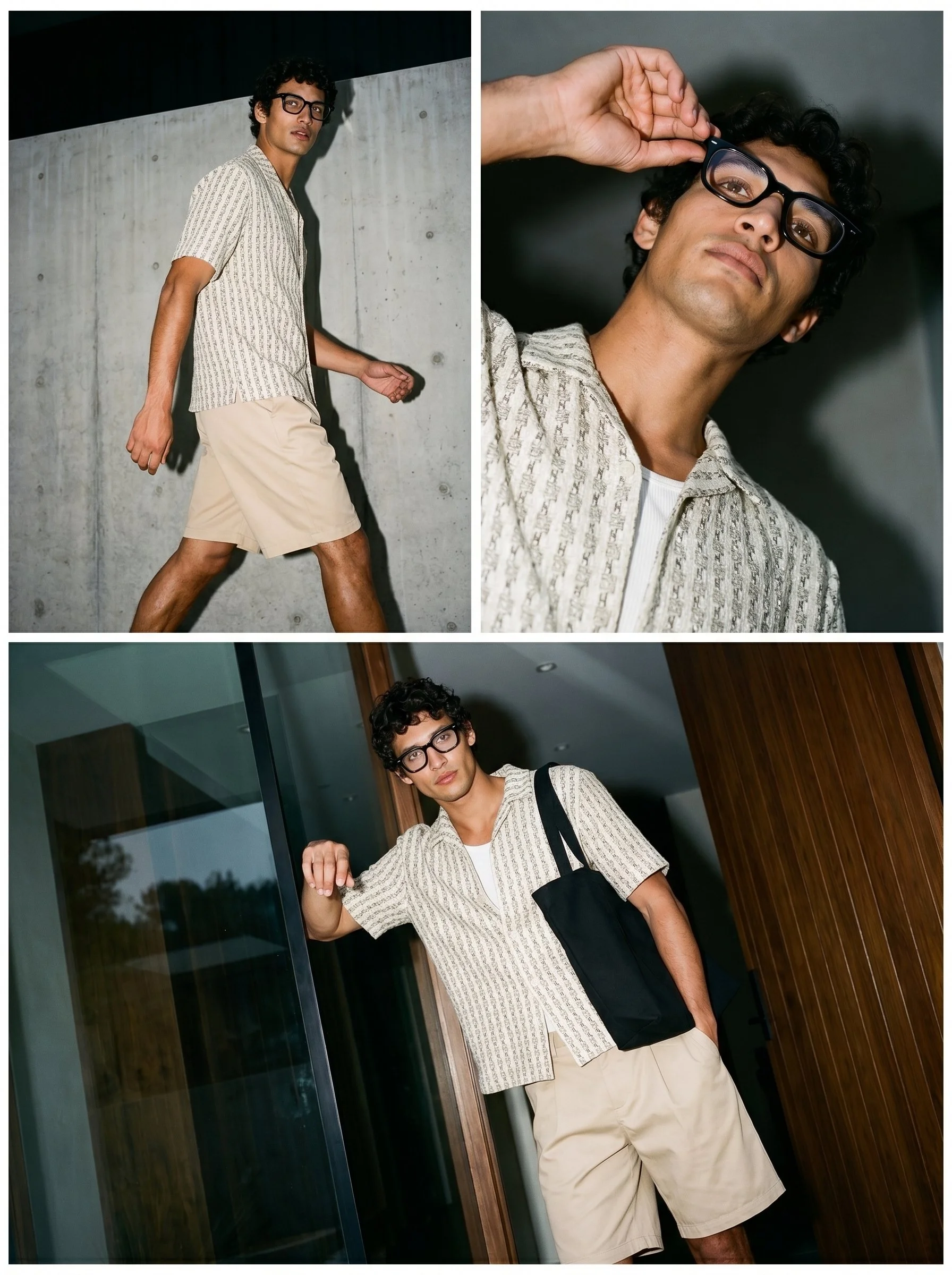 A young man with curly black hair, glasses, and light skin posing inside a modern building. In the first image, he is walking past a concrete wall wearing a patterned short-sleeve shirt and beige shorts. In the second image, he is standing by a glass
