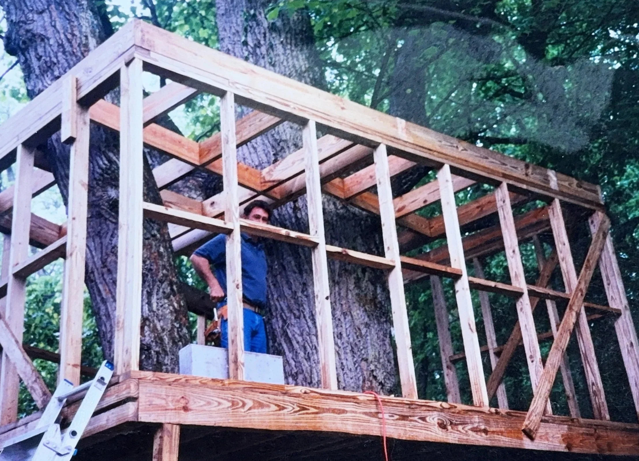 R.E. Arnold's — Bob framing a structure in his early years as a carpenter