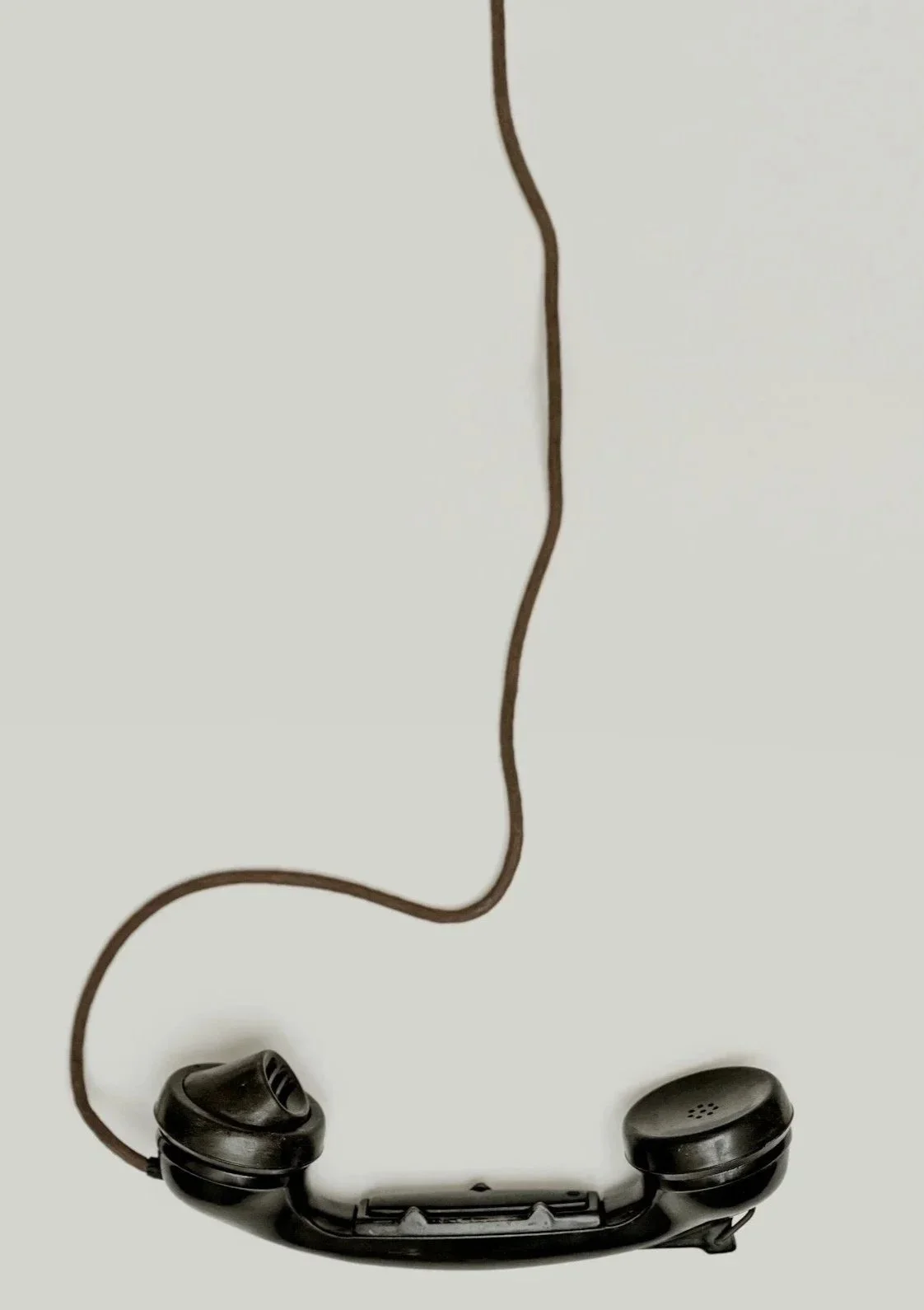 Phone with cord illustrates an invitation to contact Pat McNamara Real Estate for your real estate needs in Yorkville, Kendall County, Illinois